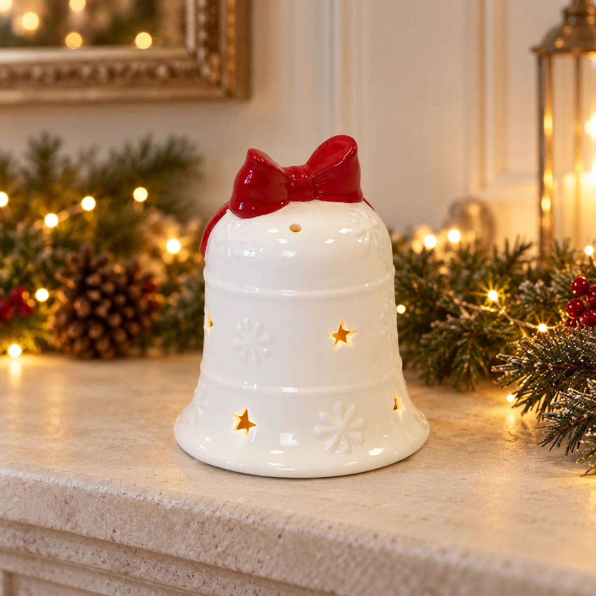 Satchville white LED Christmas bell with red bow, decorative light-up mantel ornament
