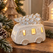 Cream glazed LED Christmas camper van with textured tree on its roof in cosy Christmas tabletop display