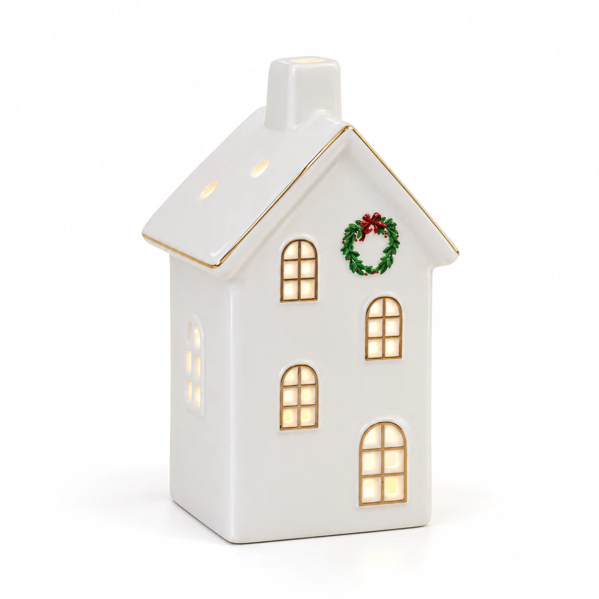 Medium white LED house with wreath on a white studio background