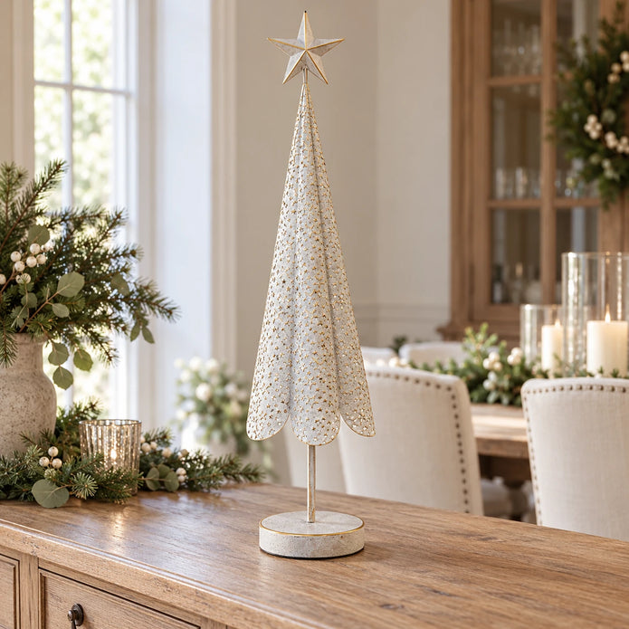 Extra large white and gold metal Christmas tree on a country-house sideboard.