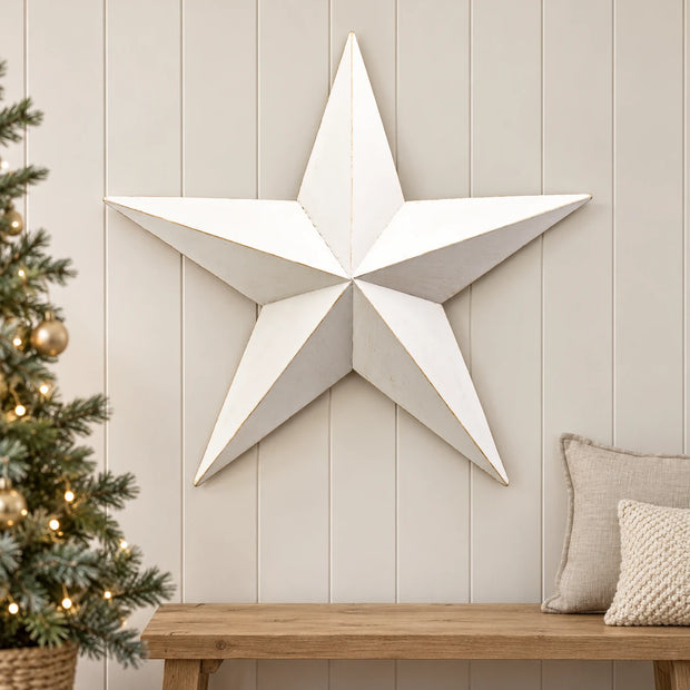 Large white metal wall hanging star decoration, perfect for Christmas decor, by Satchville.