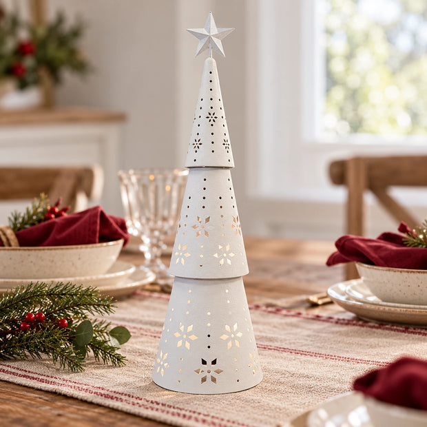Large white metal LED Christmas tree by Satchville, lit up with bright lights, perfect for holiday decoration on a table.
