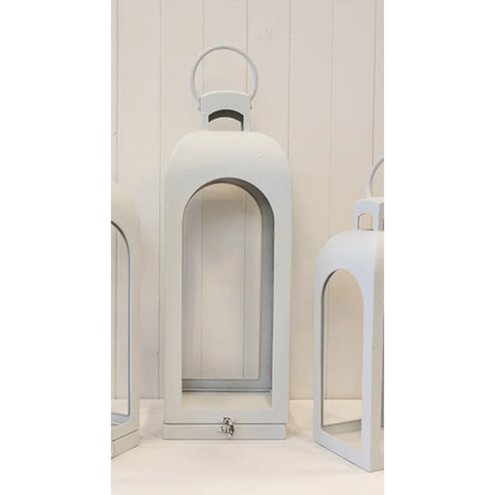 Close detail of off-white lantern arched sides and rounded ring handle