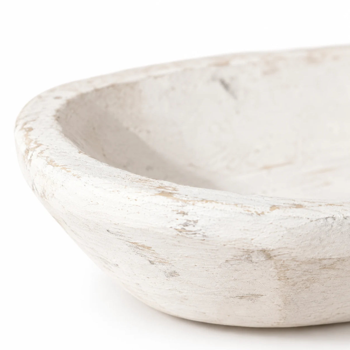 Close-up of the white mini dough bowl’s uneven rim, showing painted wood texture and subtle worn patches.