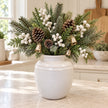 large white rustic ceramic vase, 19 × 19 × 21 cm, kitchen with neutral foliage, white berries, champagne bells and pine cones