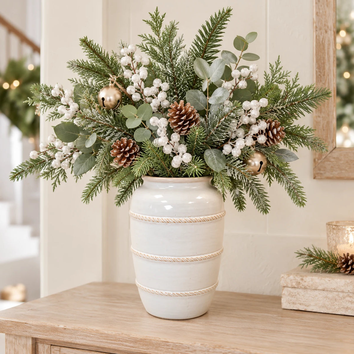 medium white rustic ceramic vase, 16 × 16 × 23 cm, console with neutral foliage, white berries, champagne bells and pine cones