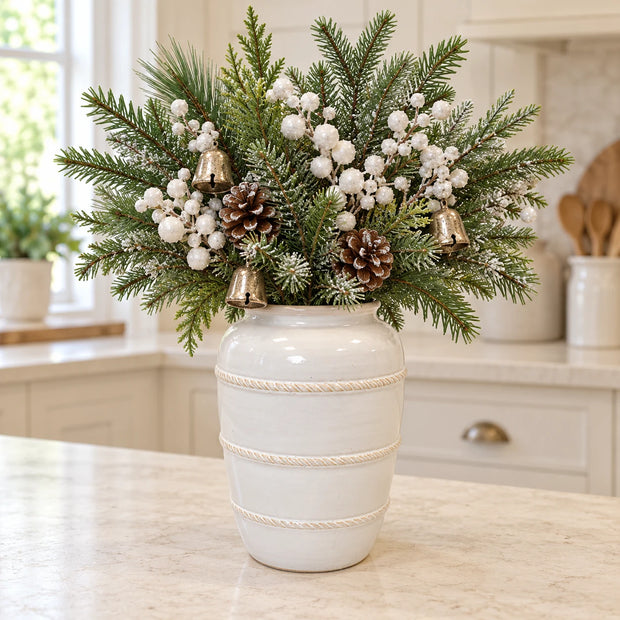 medium white rustic ceramic vase, 16 × 16 × 23 cm, kitchen with neutral foliage, white berries, champagne bells and pine cones