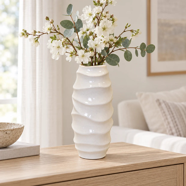 White Satchville ceramic vase with sculpted wave design, 31cm tall, featuring a sleek, modern appearance perfect for home decor.