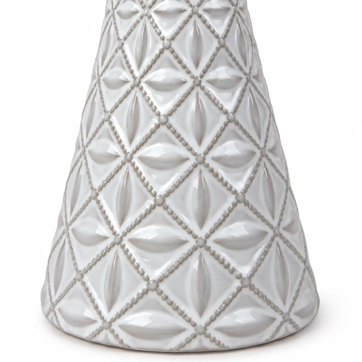 small white star glazed ceramic Christmas tree close-up of geometric embossed pattern