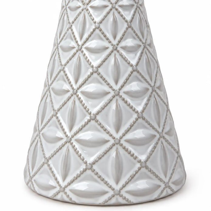 small white star glazed ceramic Christmas tree close-up of geometric embossed pattern