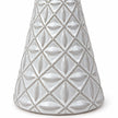 small white star glazed ceramic Christmas tree close-up of geometric embossed pattern