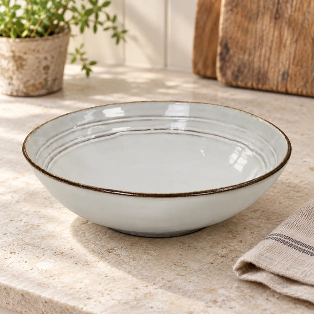 White Satchville stoneware pasta bowl for serving pasta and salads, with a smooth, glazed finish perfect for kitchen and dining.