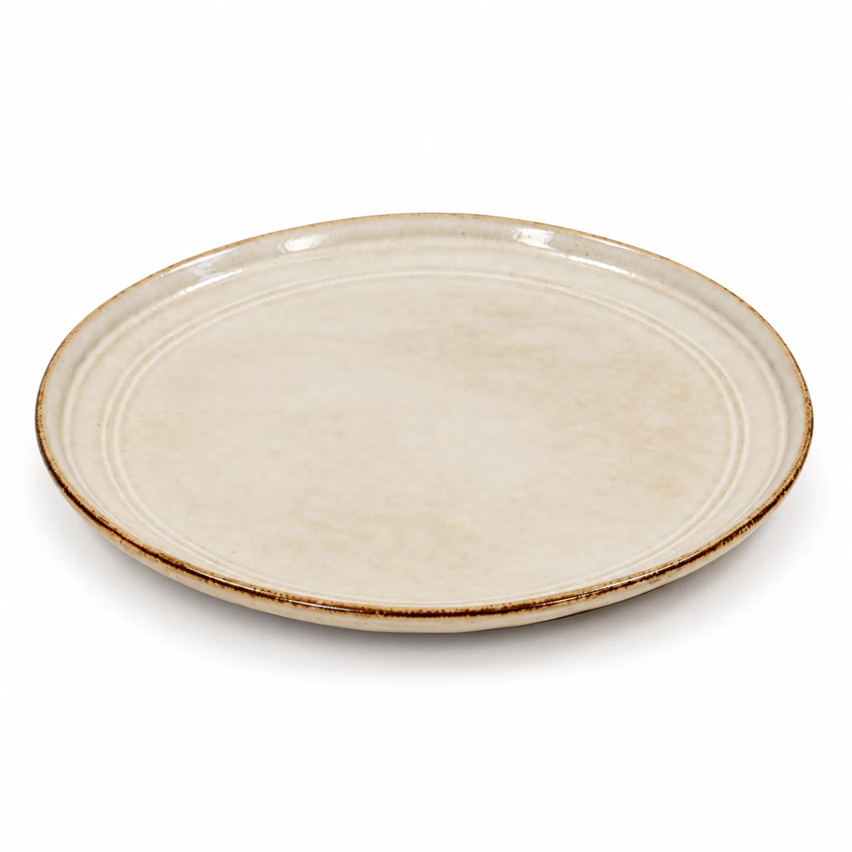 White stoneware side plate isolated on a white background