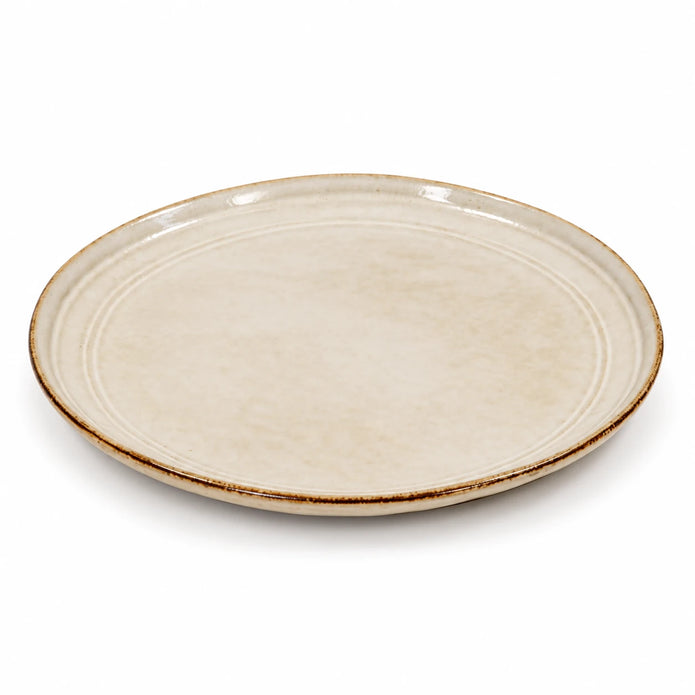 White stoneware side plate isolated on a white background