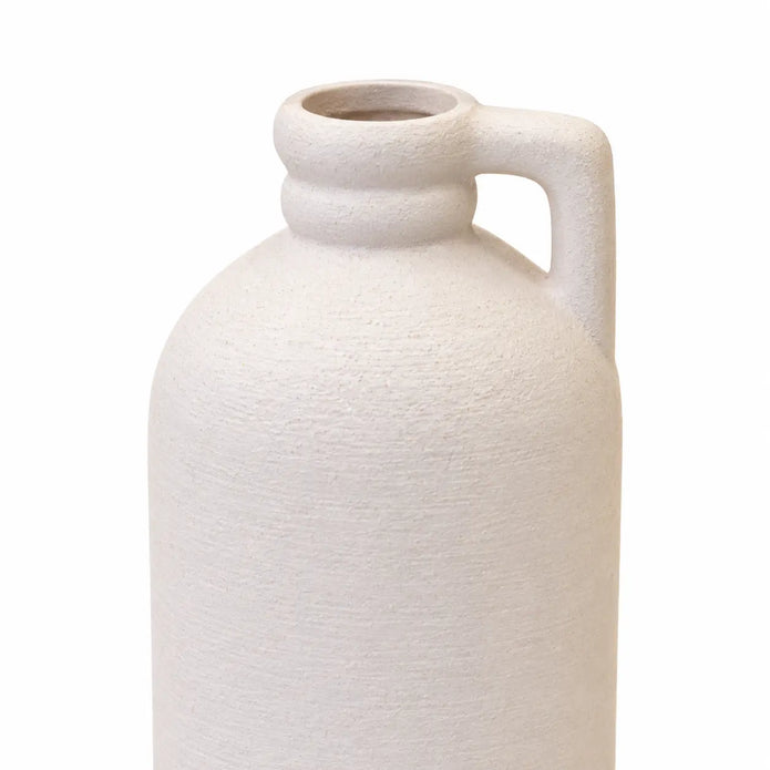 Close-up of the white bottle vase's textured finish, ringed neck and small rectangular handle