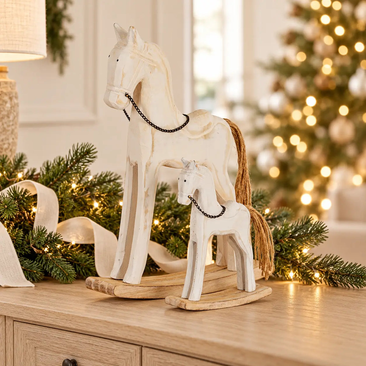 Small and large whitewashed wooden rocking horses styled together for Christmas, sold individually