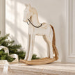 Large 37 cm whitewashed wooden rocking horse on a Christmas mantel