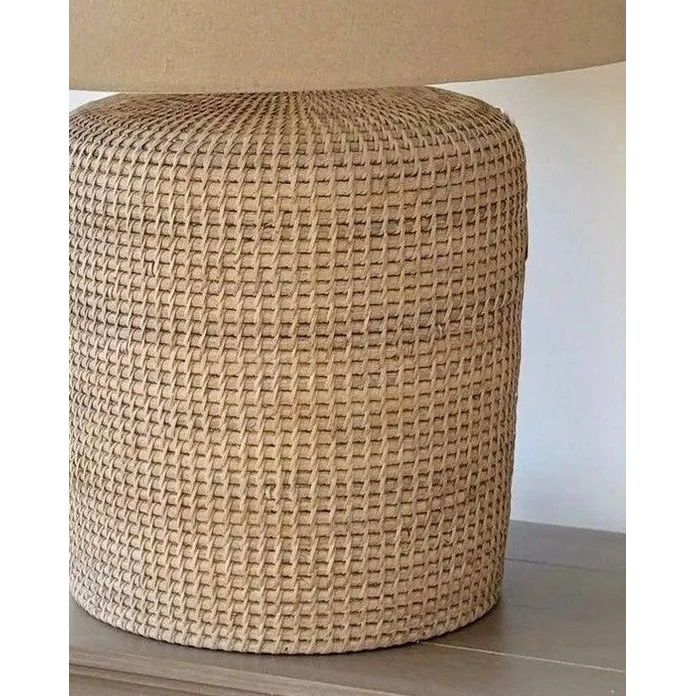 Large Lows Rattan Table Lamp with woven rattan design and sturdy base, perfect for ambient lighting in living spaces.