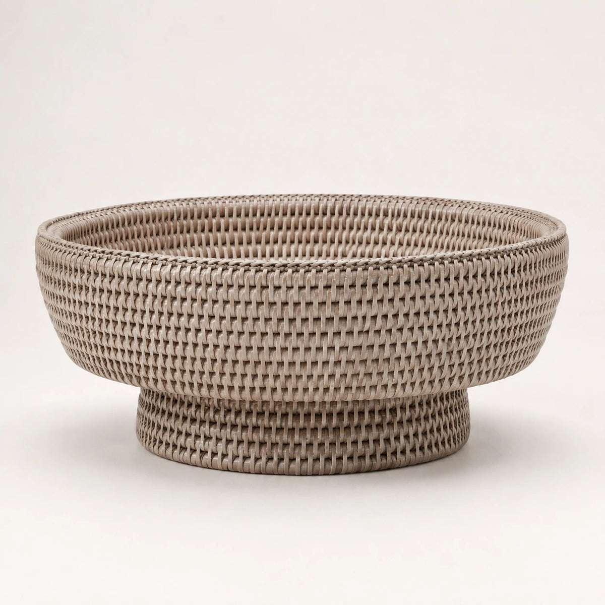Wickham Rattan Footed Fruit Bowl, side view of the empty pale woven footed bowl