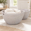 Lows Wickham rattan laundry baskets in a laundry room