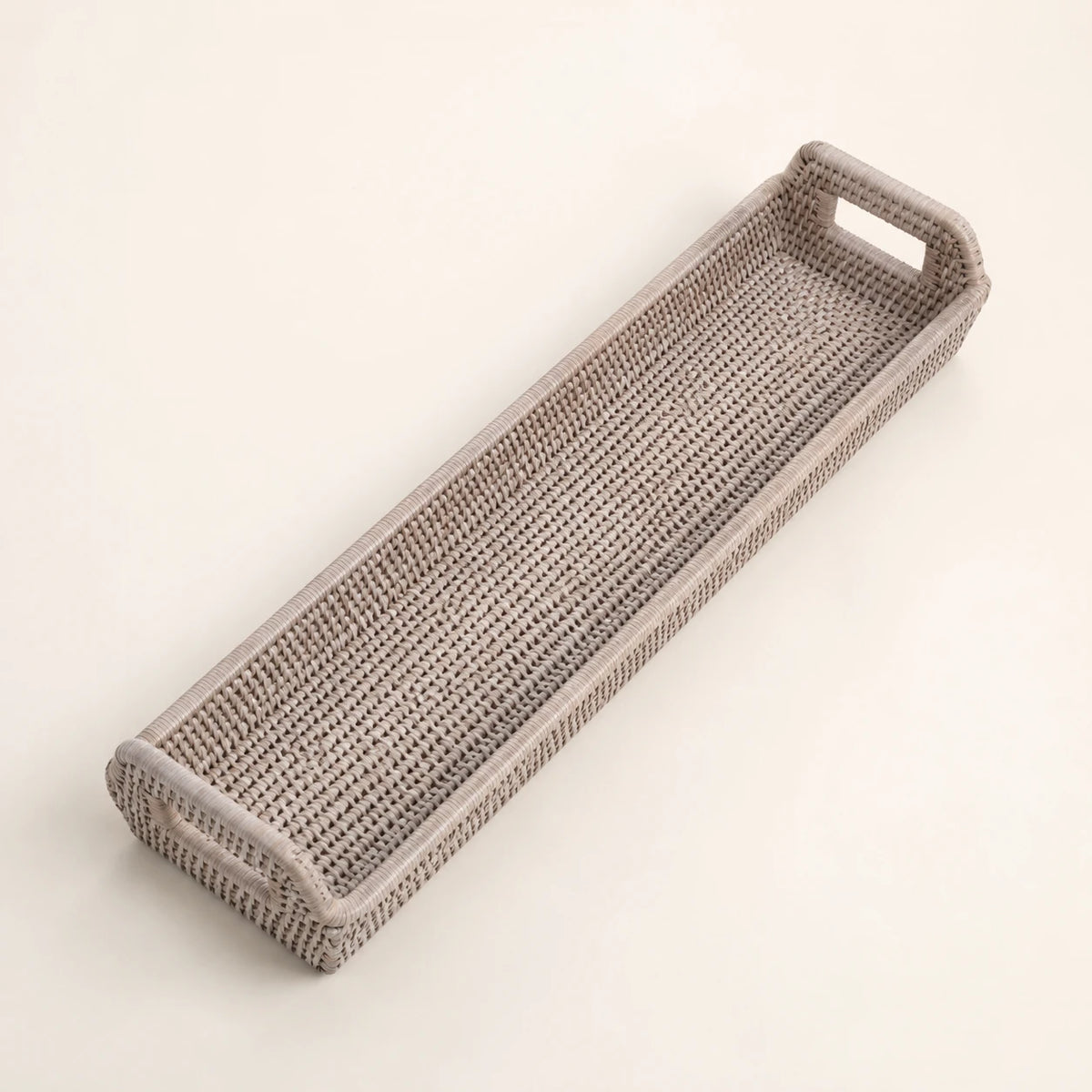 Wickham Rattan Narrow Rectangle Tray, overhead angled view of the empty narrow woven tray