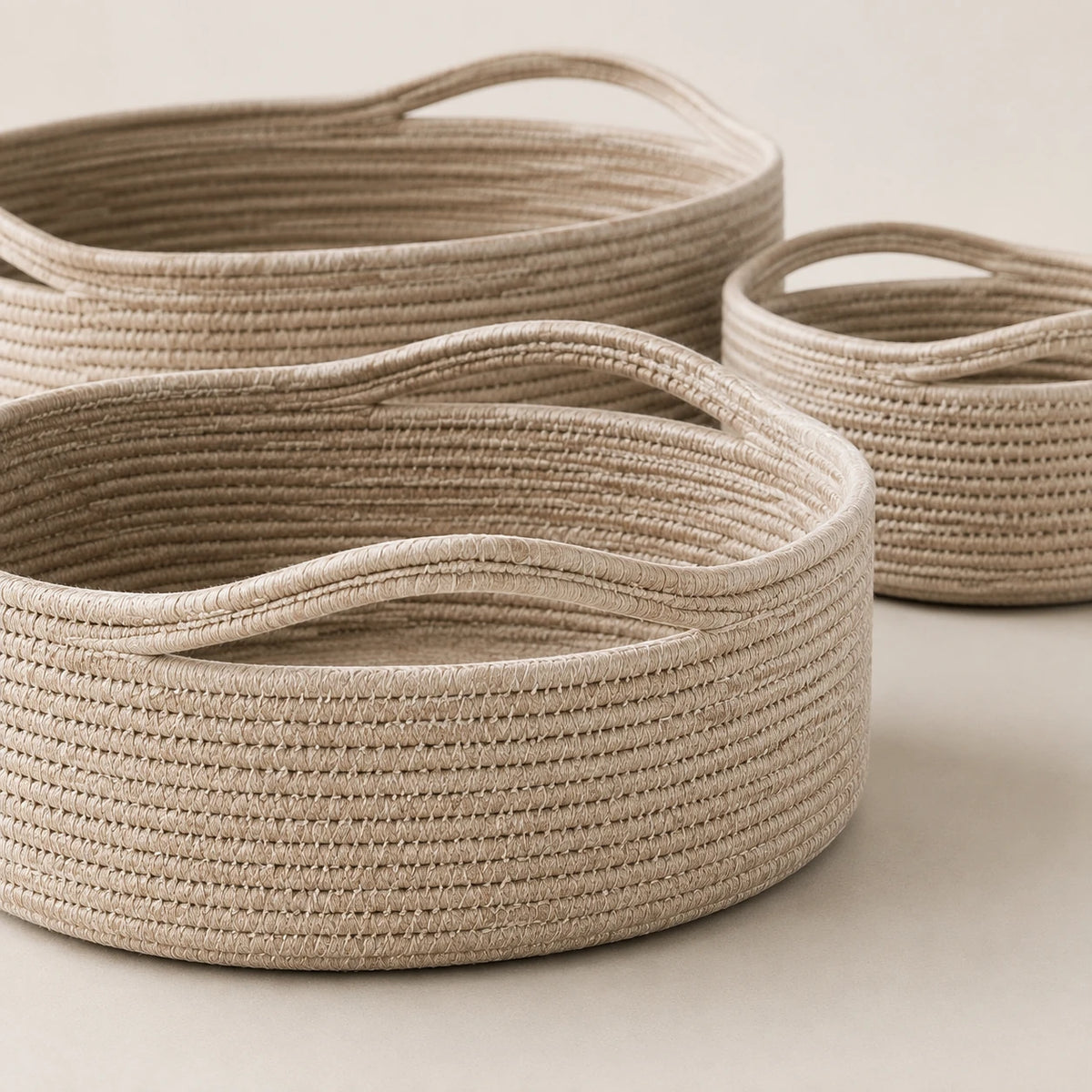 Wickham Rattan Oval Storage Basket, close-up of the pale woven baskets and integral handles