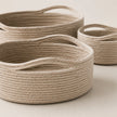 Wickham Rattan Oval Storage Basket, close-up of the pale woven baskets and integral handles