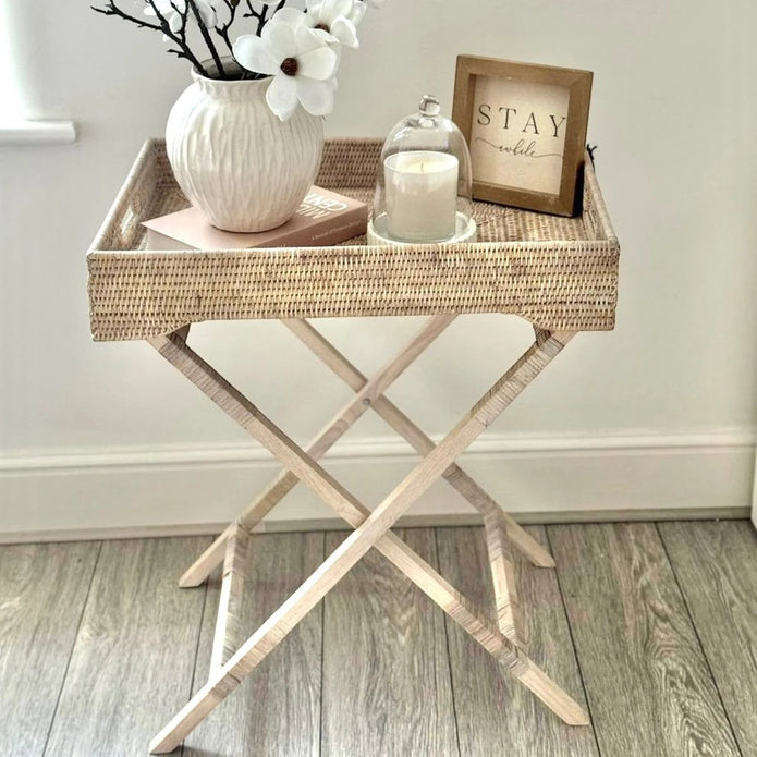 Lows rattan rectangle tripod side table with wooden legs, modern furniture piece for living room or bedroom decor.