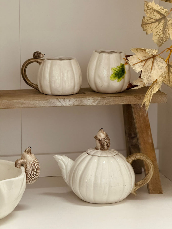 Widdop & Co Hedgehug pumpkin and hedgehog teapot featuring autumn-themed ceramic design with fall colors and whimsical details.