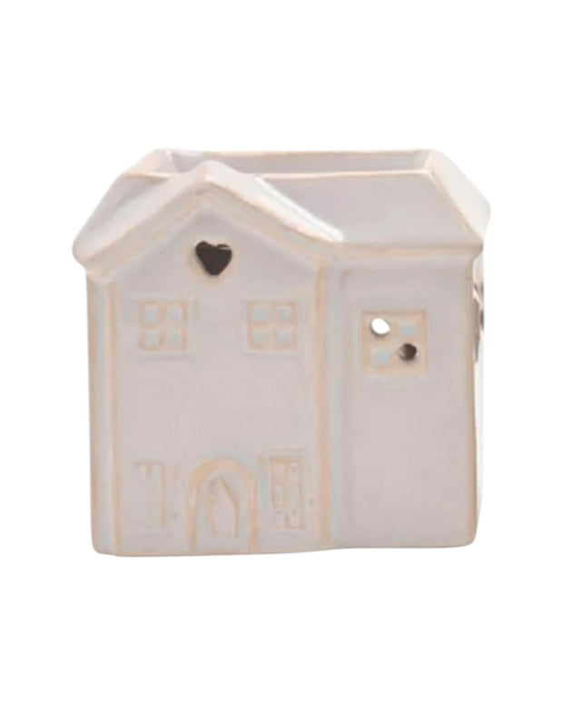 Beige ceramic house wax burner by Widdop & Co, small decorative candle warmer with detailed house design.
