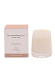 Soothe Therapy Candle by Widdop & Co with peony and petitgrain scent, featuring a white wax candle in a glass jar.