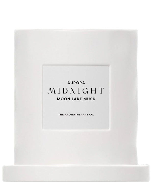 Widdop & Co Midnight Candle by The Aromatherapy Co. featuring Moon Lake Musk scent, with a sleek candle design and soft glow.