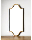 Brass coloured long Moroccan style mirror with intricate metal frame, ideal as decorative wall furniture piece.