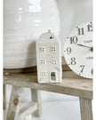 Beige ceramic house tea light holder by Widdop & Co, ideal for home décor and ambient lighting.