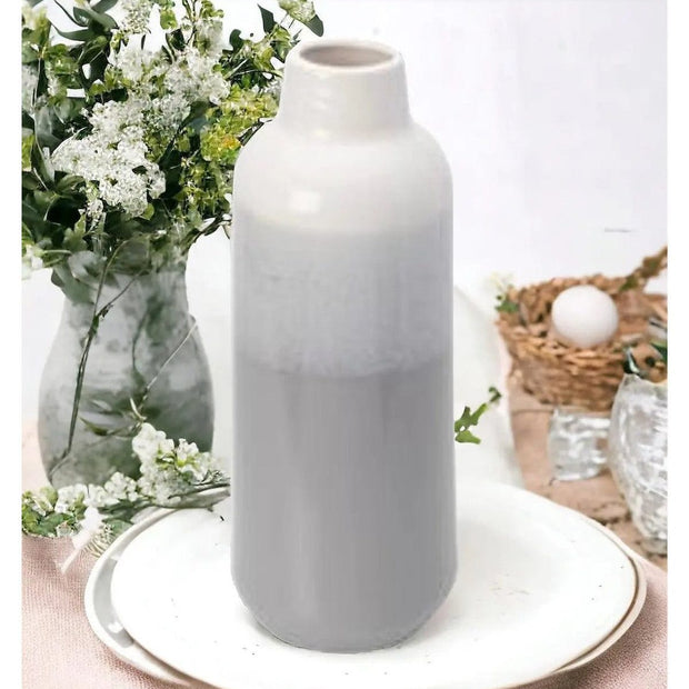 Grey ceramic reactive glaze vase, Widdop & Co home decor piece with a textured, artistic finish for stylish interior accents.