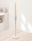 Slim white metal candlestick holder for home decor by Widdop & Co, showcasing a sleek and modern design.