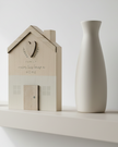 Beige Moments Wooden House from Widdop & Co, a charming kitchen and dining decorative piece with a family-themed design.
