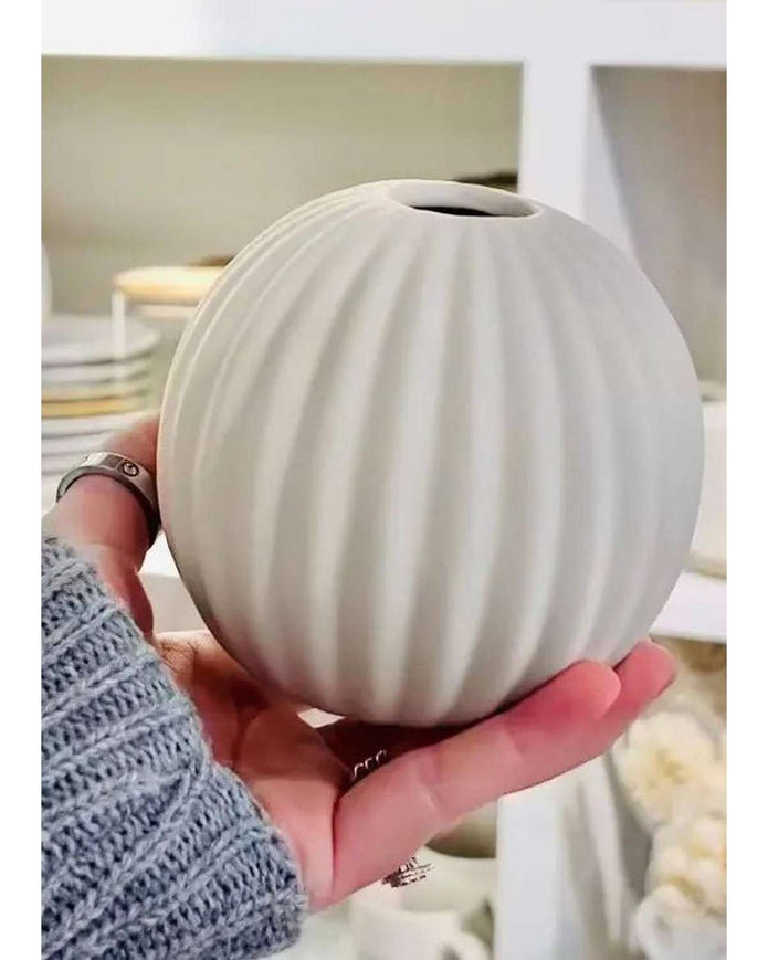 Neutral beige ribbed small round vase from Widdop & Co, ideal for kitchen and dining decor.