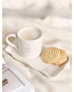 Rectangular beige plate with matching mug set from Widdop & Co, perfect for kitchen and dining decor.