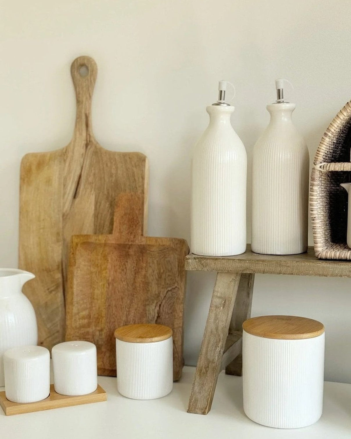 White ceramic ribbed storage jar with wooden lid, ideal for kitchen and dining organization, by Widdop & Co.