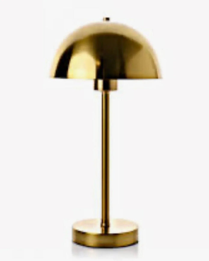 Gold Dome Lamp by Widdop & Co features a sleek, rounded design with a gold finish, ideal for modern interior lighting.