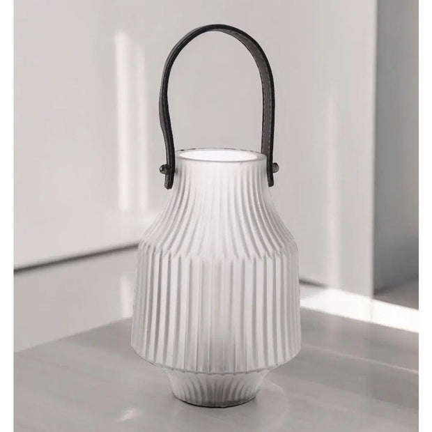 White frosted LED lantern by Widdop & Co with a soft glow, ideal for ambient lighting and decorative use.