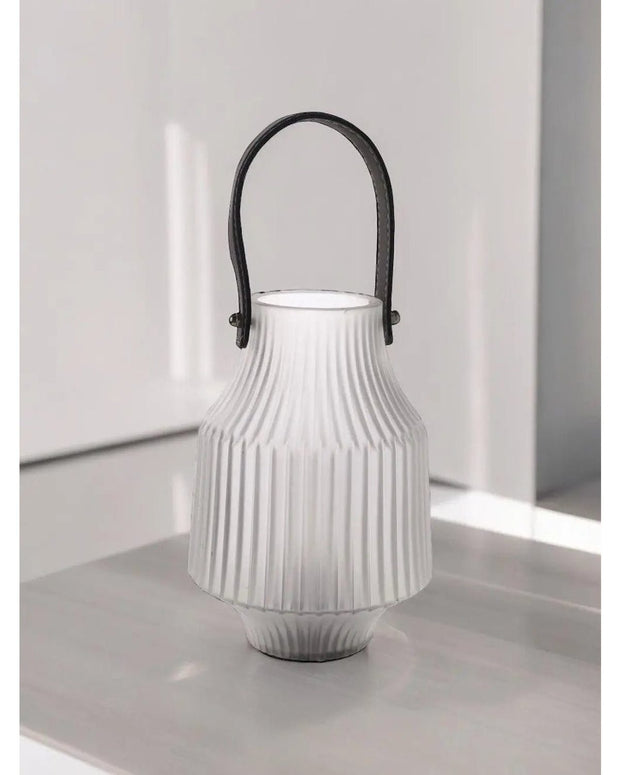 White frosted LED lantern by Widdop & Co with a soft glow, ideal for ambient lighting and decorative use.