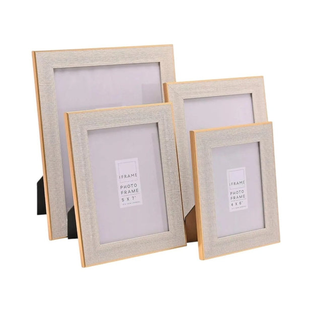 Natural wood and gold effect photo frame by Widdop & Co holding a 4x6 photo, showcasing elegant framing for cherished memories.