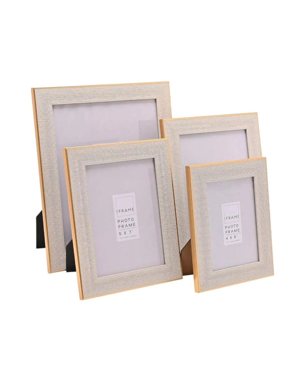 Natural wood and gold effect photo frame by Widdop & Co holding a 4x6 photo, showcasing elegant framing for cherished memories.