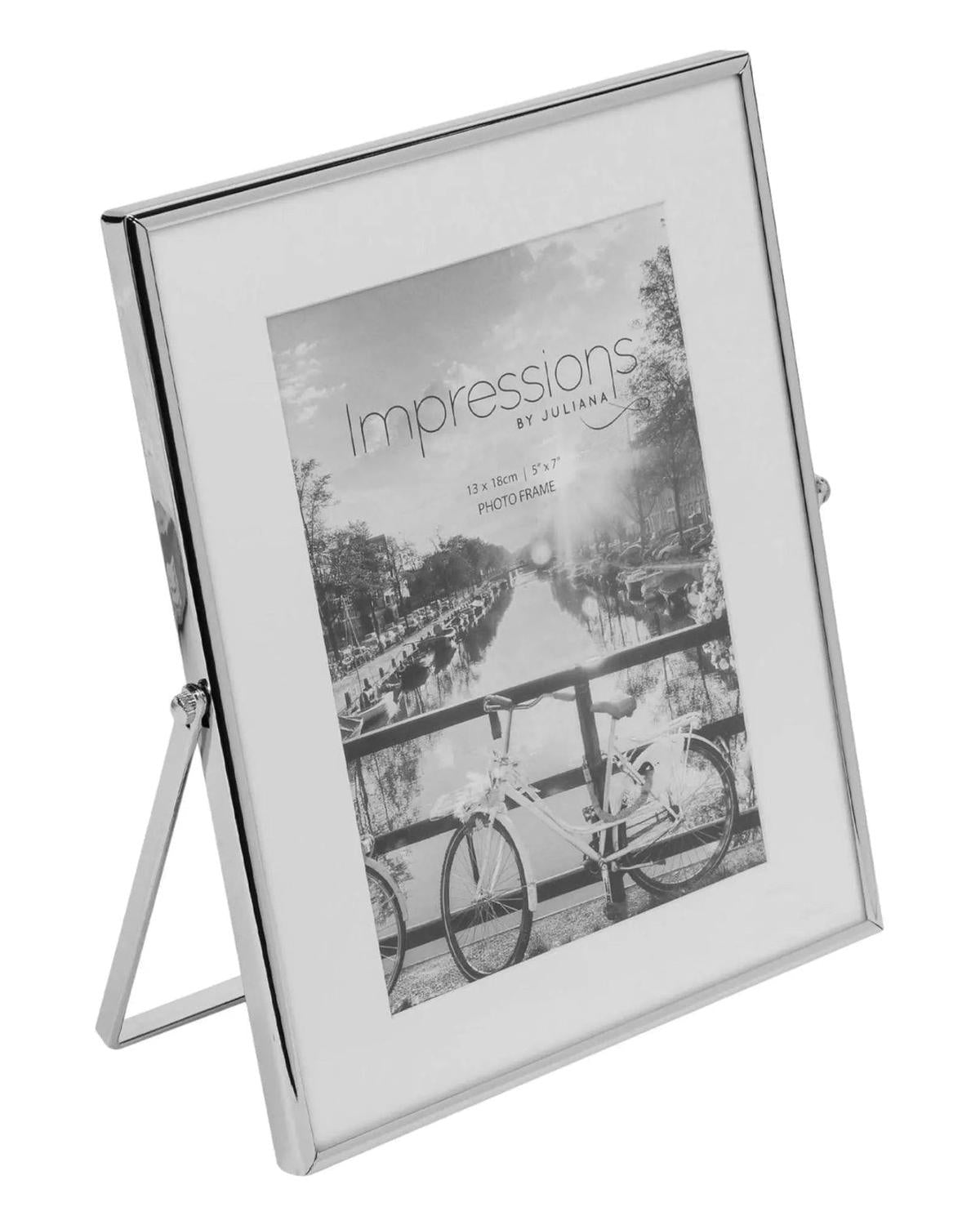 Elegant silver-colored photo frame with white border, designed for 4x6 inch photos by Widdop & Co.