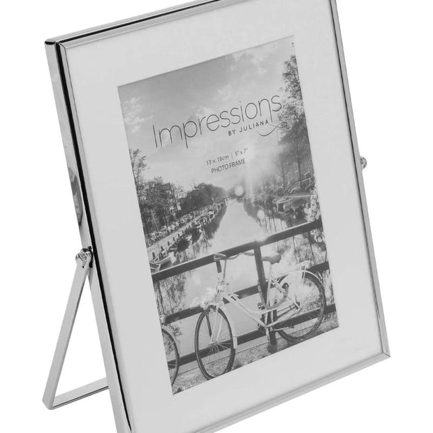Elegant silver-colored photo frame with white border, designed for 4x6 inch photos by Widdop & Co.