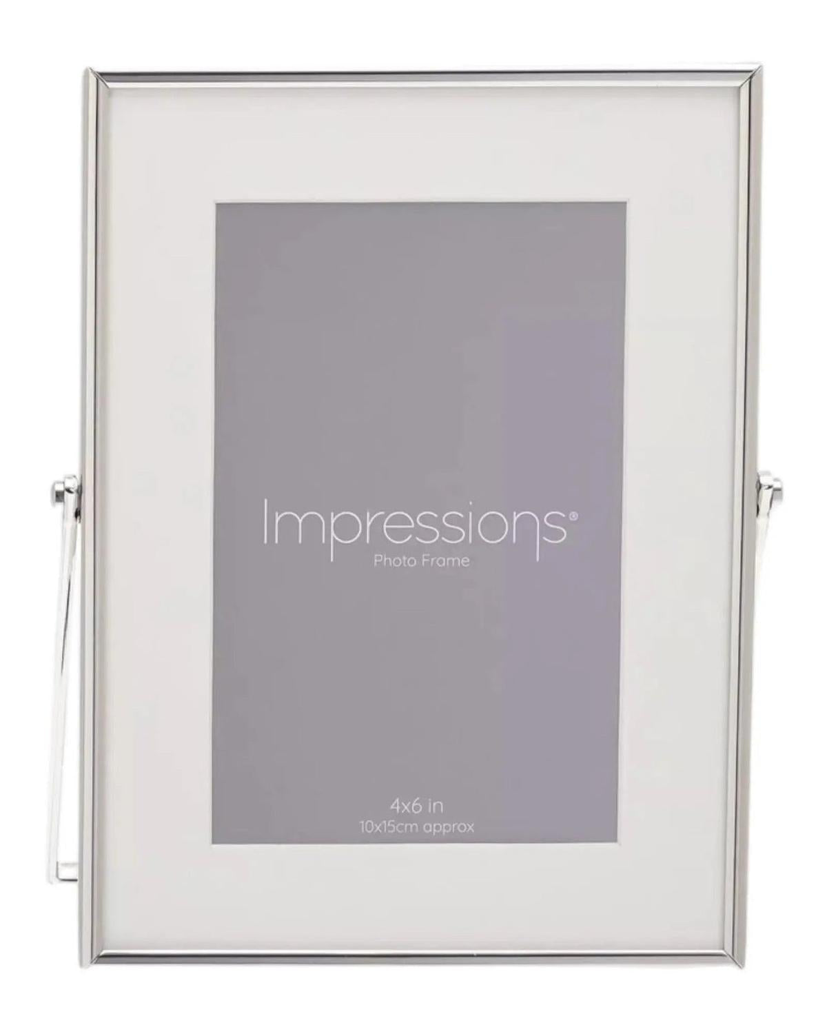 Elegant silver photo frame with a white border, designed for 4x6 photos by Widdop & Co.