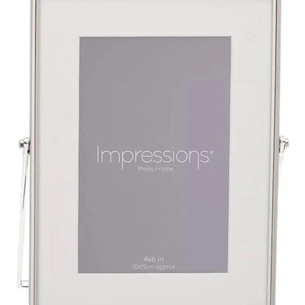 Elegant silver photo frame with a white border, designed for 4x6 photos by Widdop & Co.