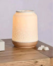 White ceramic Loire wax melt and oil electric burner with fairy lights, by Widdop & Co, featuring a decorative and functional design.